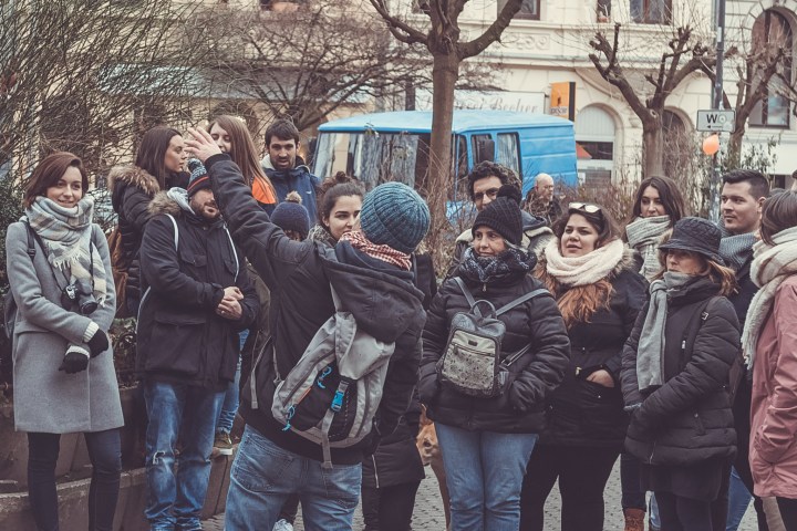 James Alexander et al. standing in front of a crowd