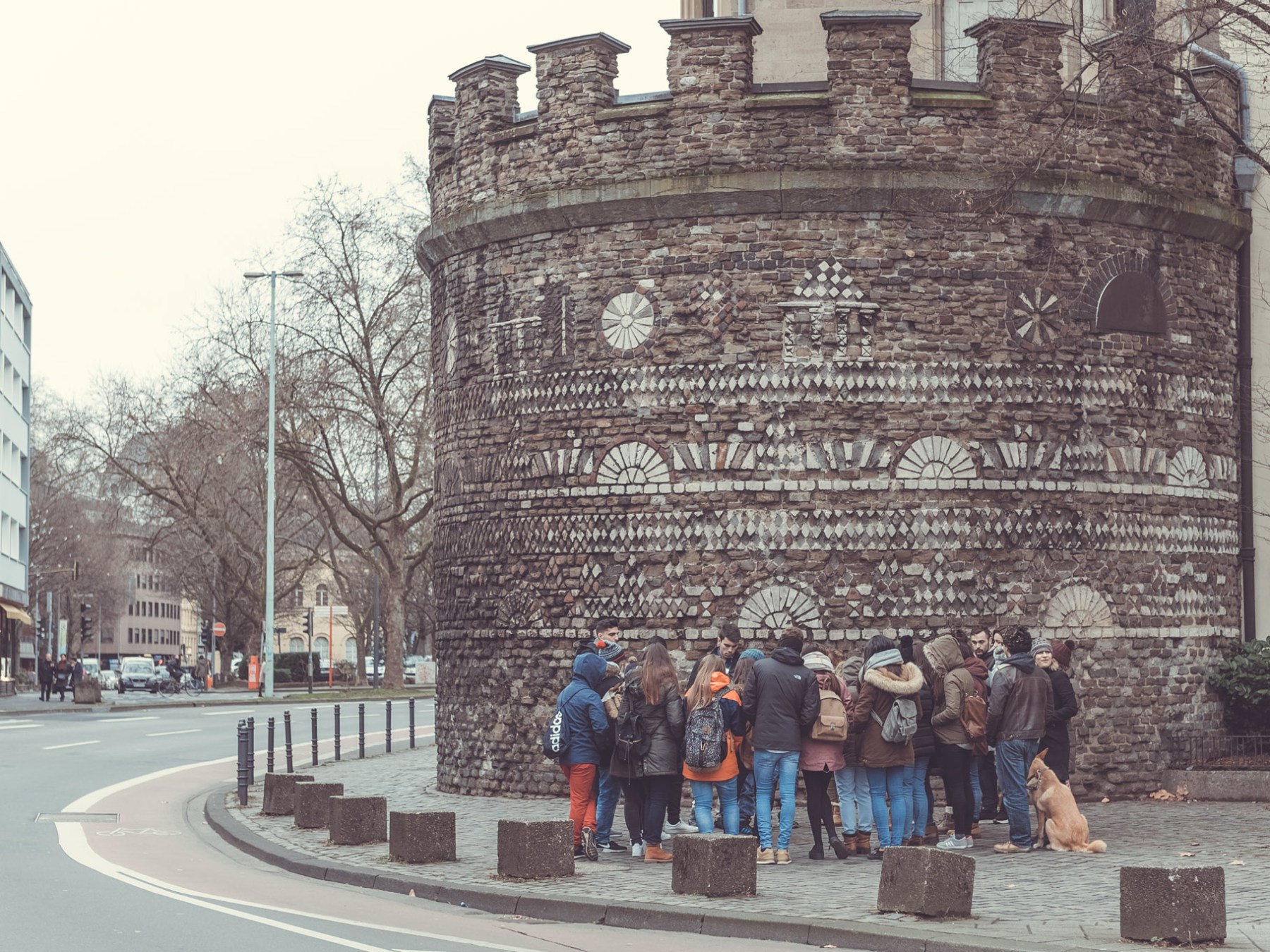 a group of people standing in front of a building