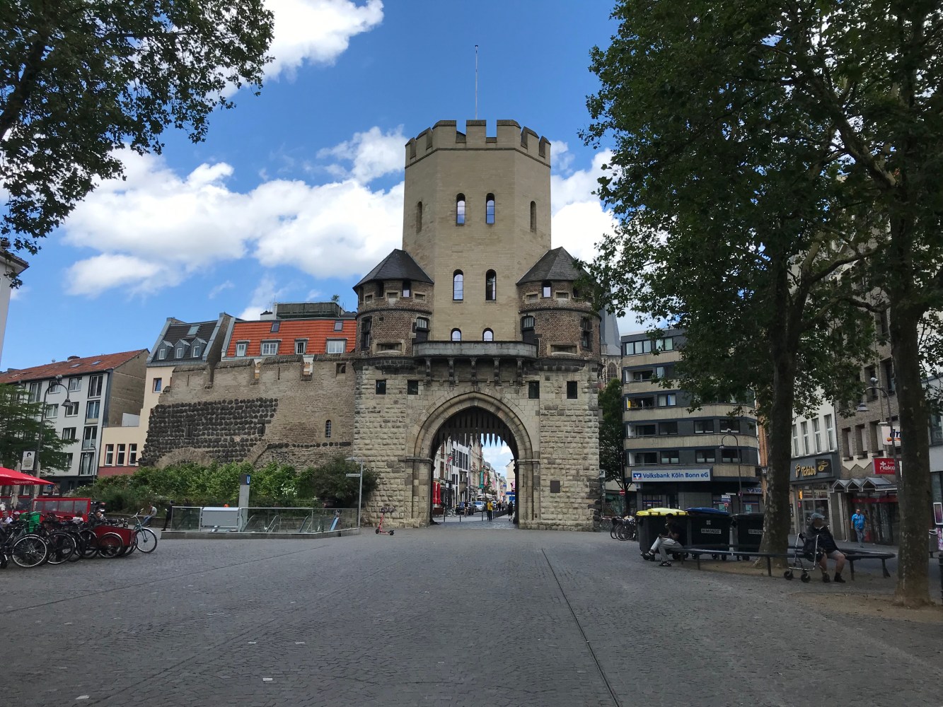 a castle with a clock on the side of a building