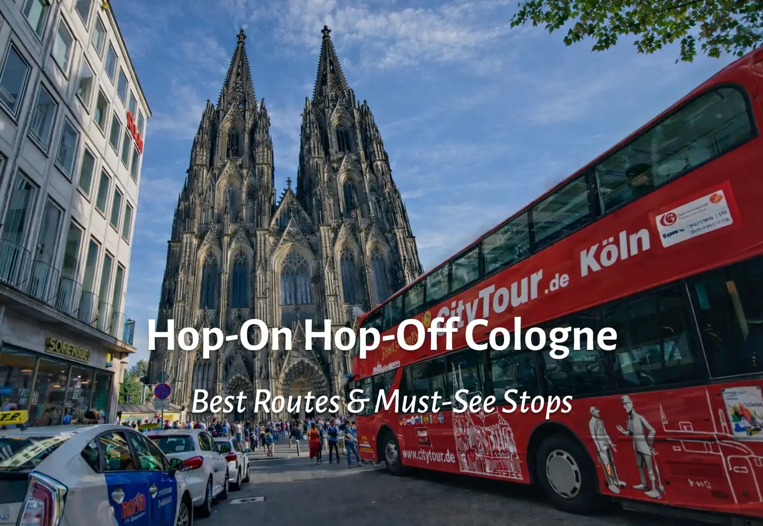 Hop-on hop-off sightseeing bus in front of Cologne Cathedral during city tour