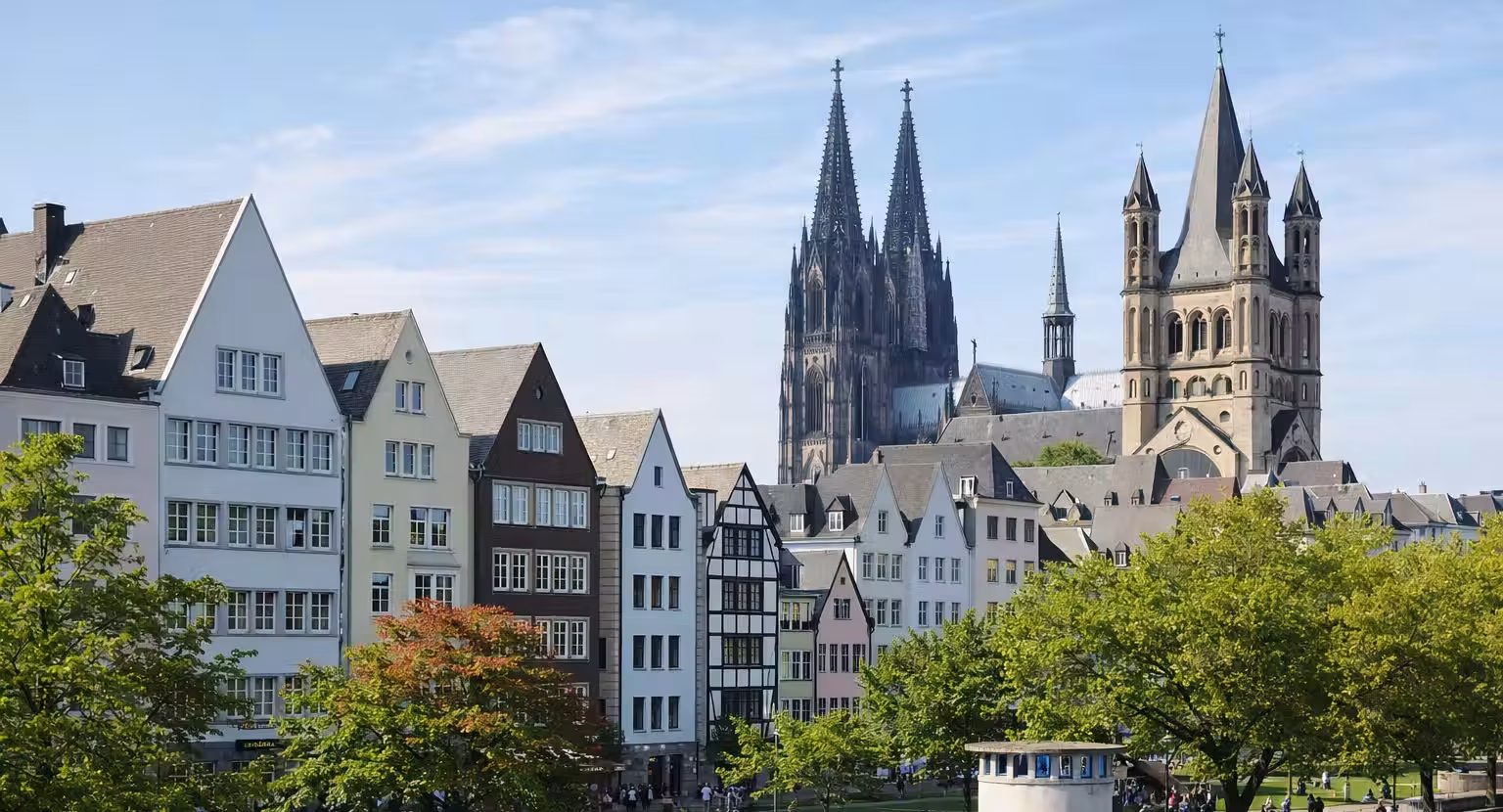 Colorful medieval houses and restaurants in Cologne Old Town Altstadt near the Rhine River