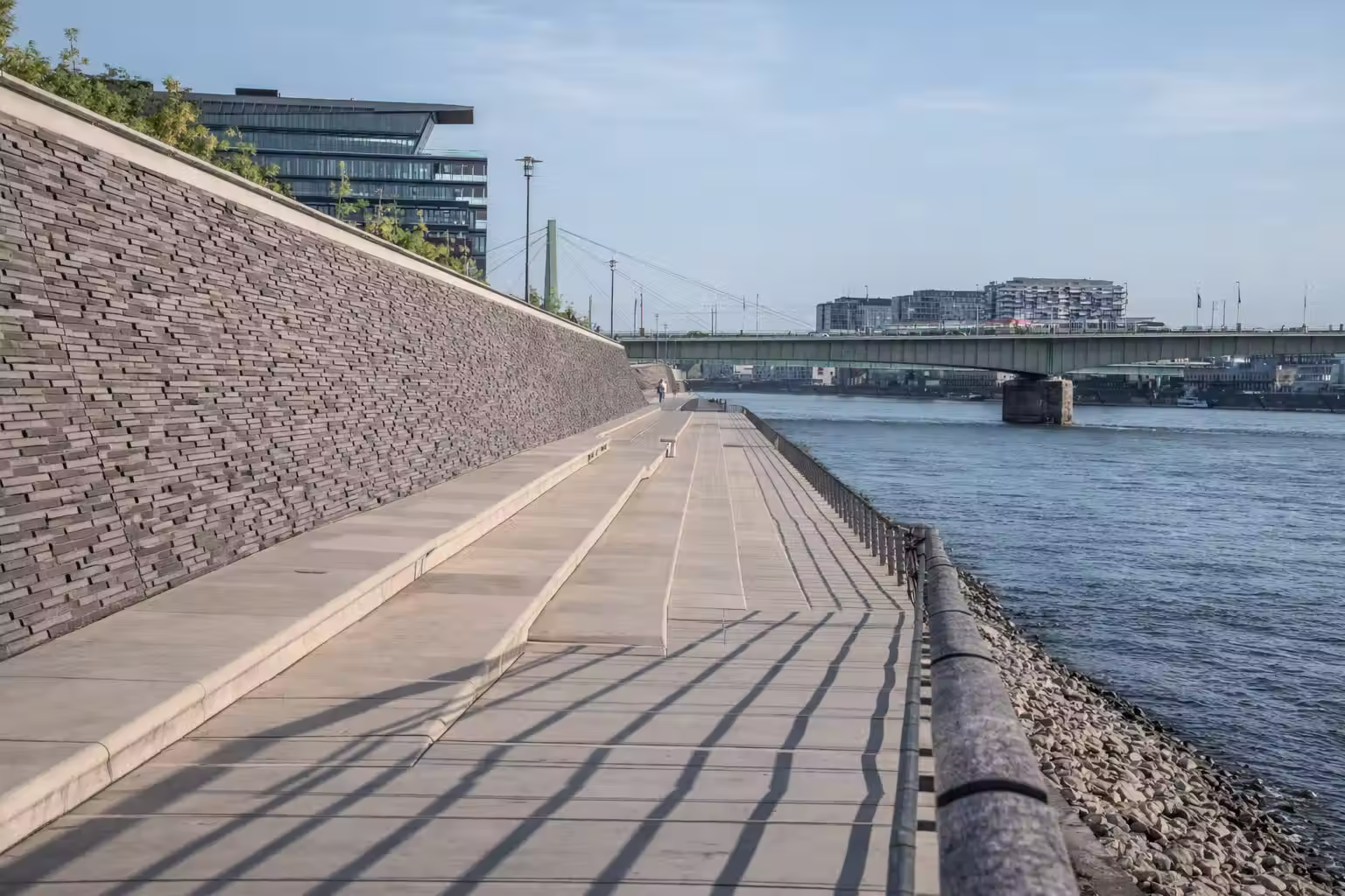 Modern promenade at Rheinauhafen district in Cologne with the Rhine river view